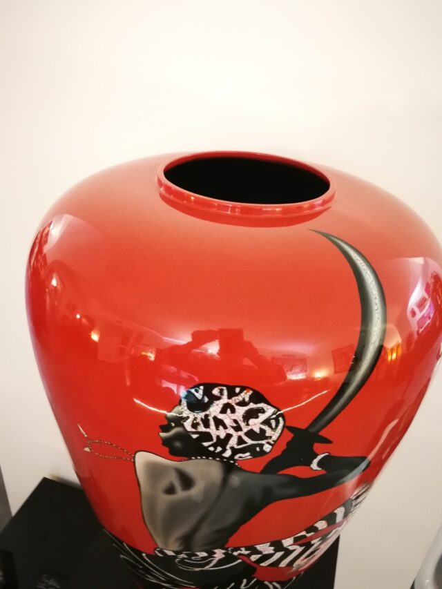 RENÉ GRUAU - PAIRE DE VASES COMBATANTS